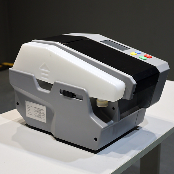 Dispensador Semiautomático de papel engomado SPK 6380 lateral izquierdo